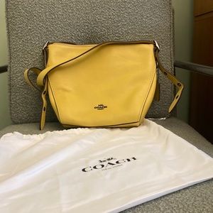 Beautiful yellow Coach shoulder bag.